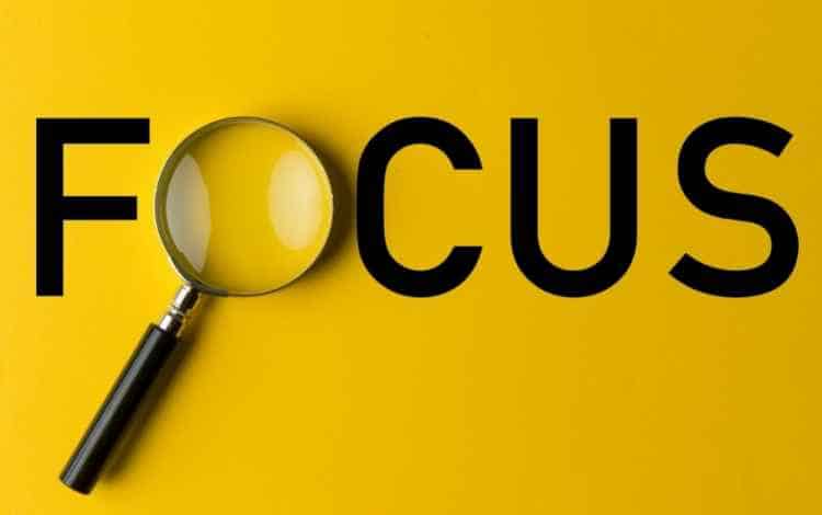 Magnifying glass over the word Focus